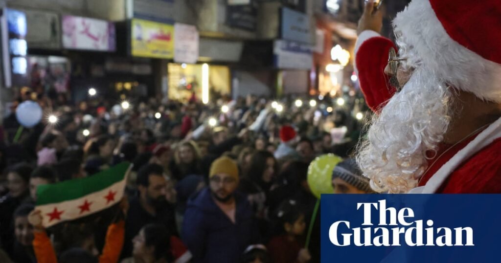 Hundreds protest in Christian areas of Syrian capital after Christmas tree burned | Syria Hundreds protest in Christian areas of Syrian capital after Christmas tree burned | Syria